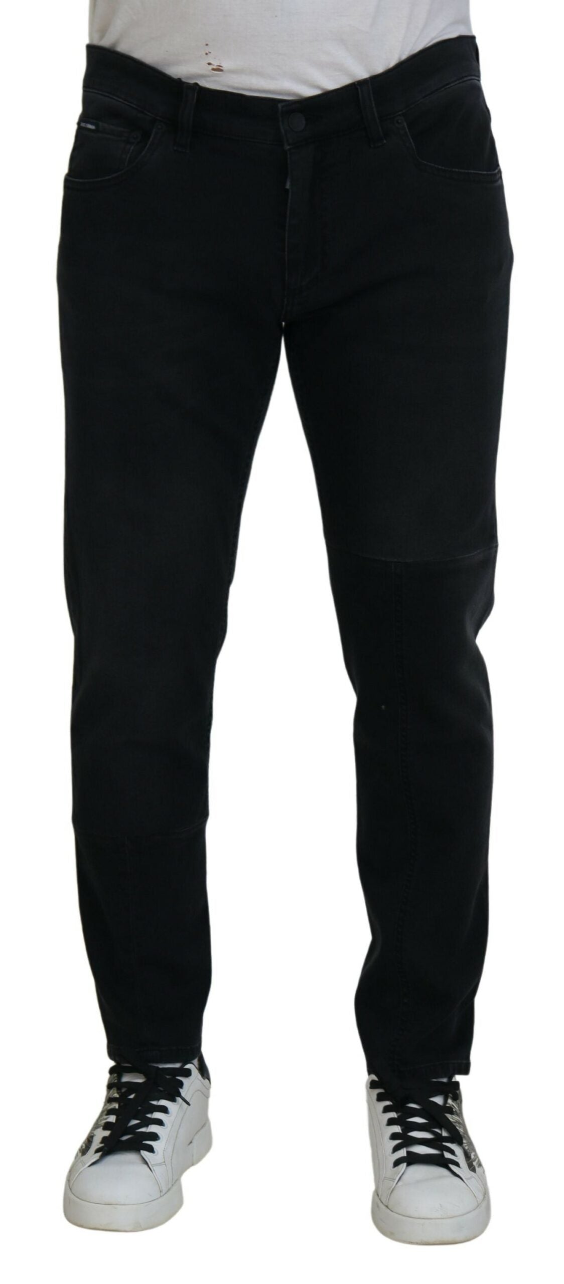 Jeans skinny en denim noir Dolce & Gabbana avec broderie d'ange, détails élégants et coupe ajustée.