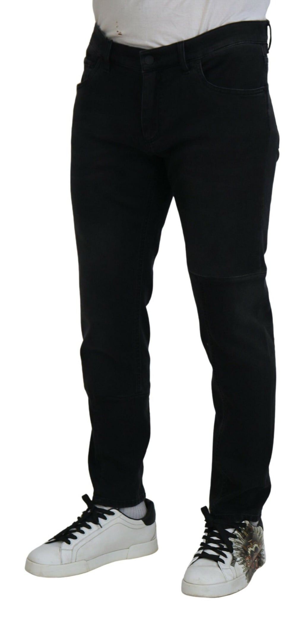 Jeans skinny en denim noir Dolce & Gabbana avec broderie d'ange, coupe ajustée et détails élégants.