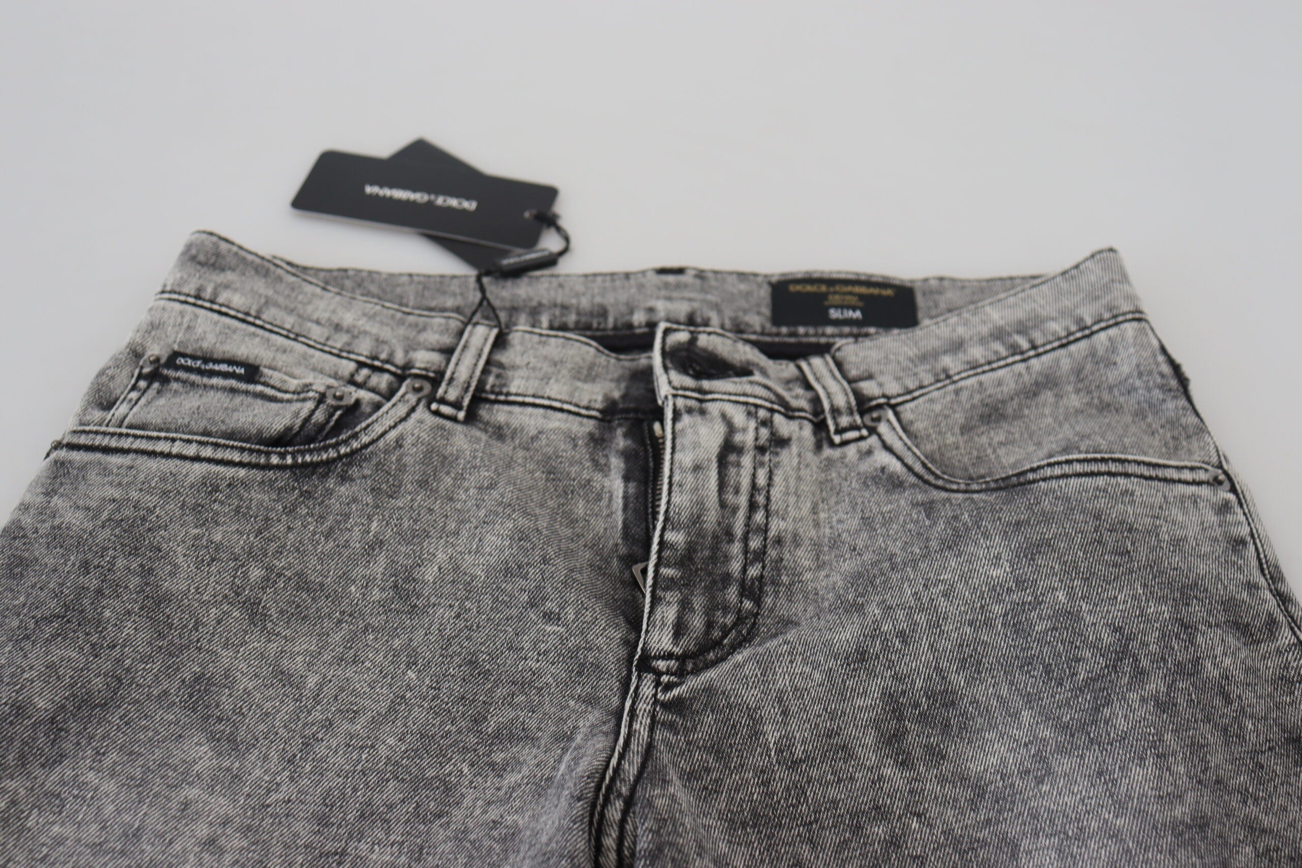 Jeans slim pour homme Dolce & Gabbana en coton gris délavé, coupe ajustée et tendance.