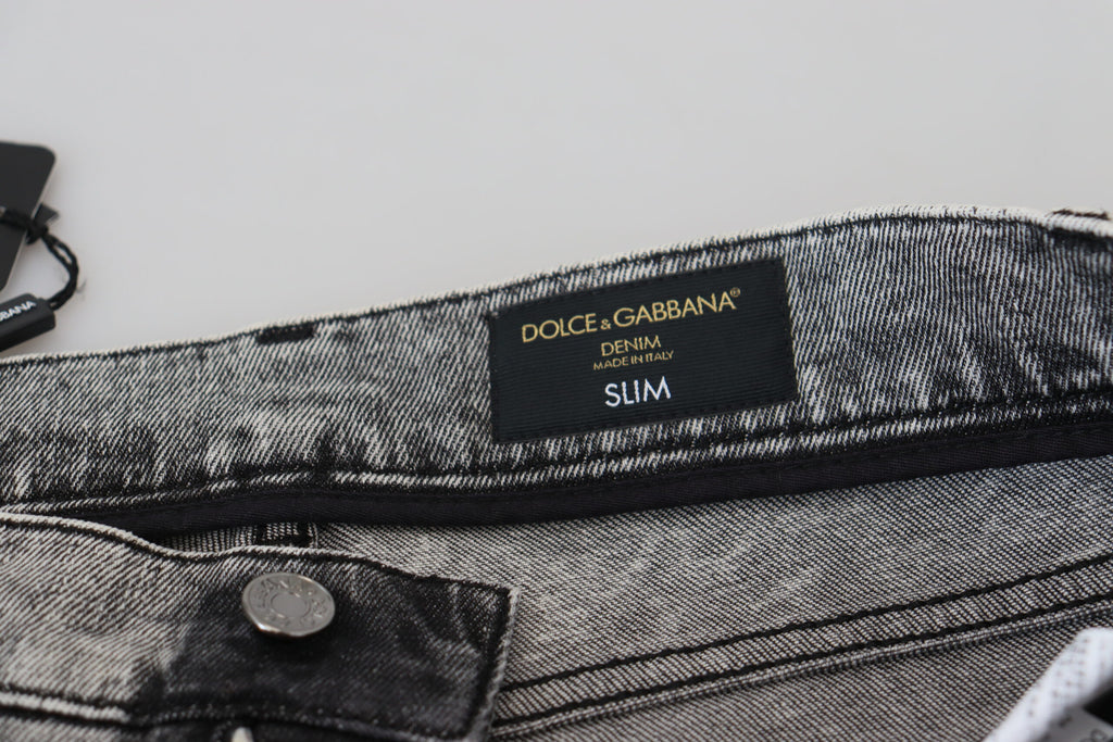 Jeans slim gris en coton délavé de Dolce & Gabbana pour homme, coupe ajustée et style décontracté.