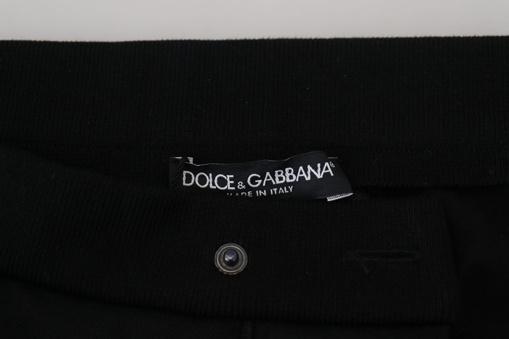Pantalons jogger en laine noire Dolce & Gabbana avec détails en forme de fer à cheval, style décontracté et élégant.