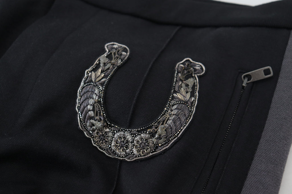 Pantalons joggers noirs en laine Dolce & Gabbana avec motif de fer à cheval, style décontracté et élégant.