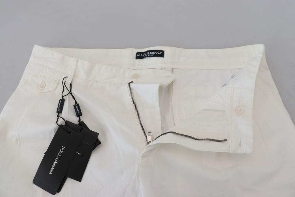 Pantalons chino skinny en coton blanc de Dolce & Gabbana, vue de face avec détails de coupe ajustée.