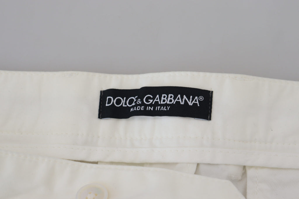 Pantalons chino skinny en coton blanc de Dolce & Gabbana, vue de face, mode élégante et ajustée.