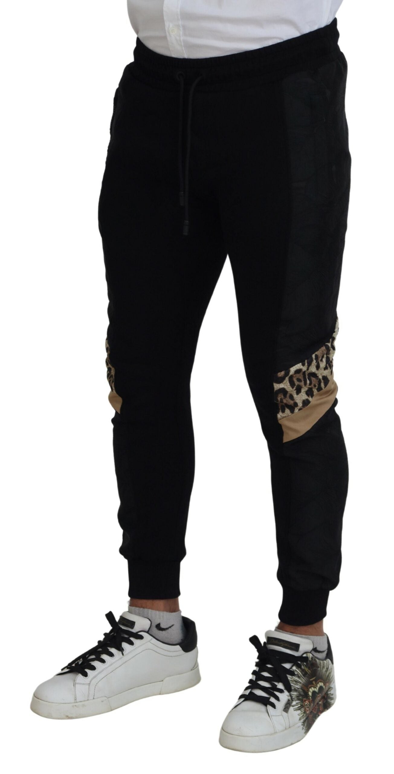 Pantalon homme jogger skinny en polyester noir de Dolce & Gabbana, style décontracté et ajusté.