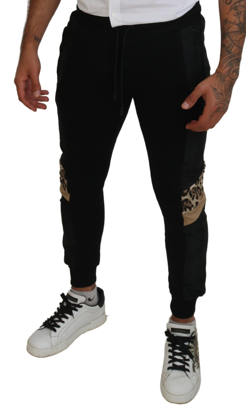 Pantalons joggers skinny en polyester noir de Dolce & Gabbana pour homme, coupe ajustée et style décontracté.