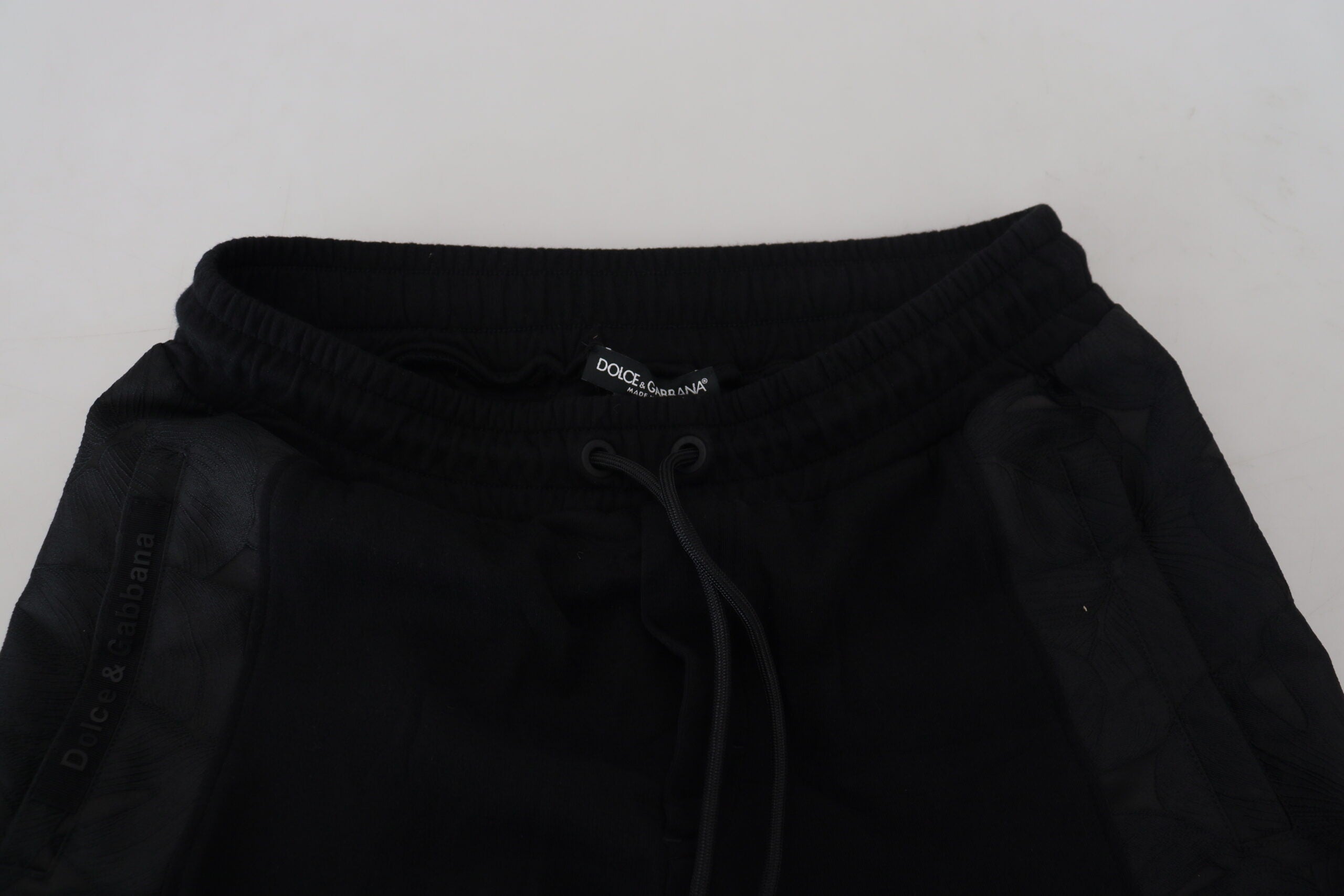 Pantalon jogging Skinny en polyester noir de Dolce & Gabbana pour homme, ajusté et confortable, avec détails élégants.
