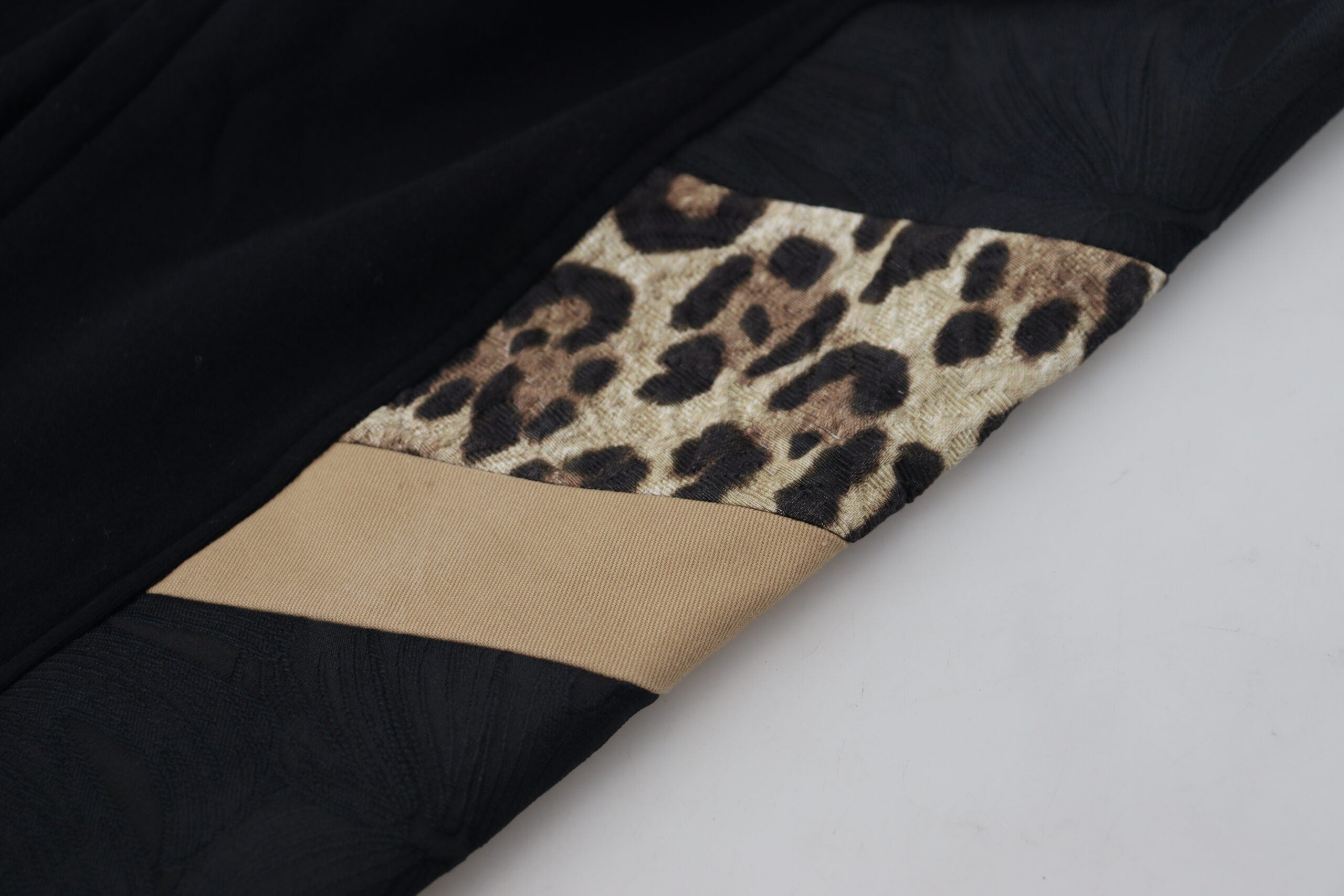 Pantalon jogger skinny en polyester noir de Dolce & Gabbana pour homme, design élégant et ajusté.
