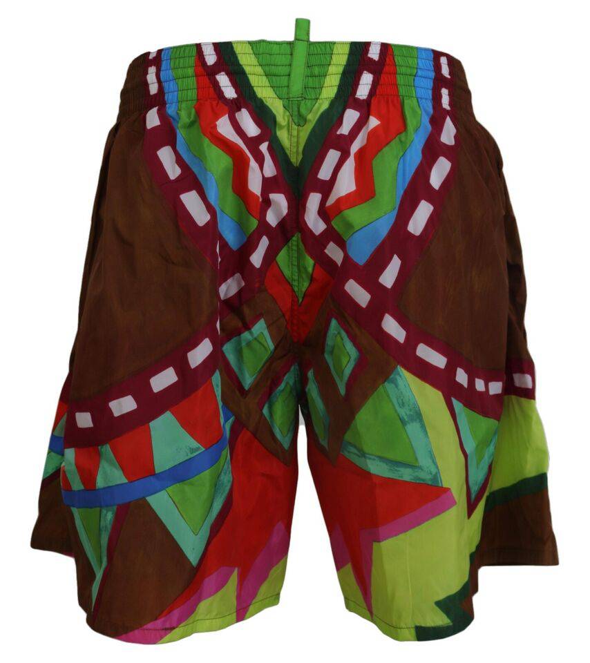 Short de bain pour homme Dsquared² à imprimé multicolore, vêtements de plage tendance avec motif coloré.