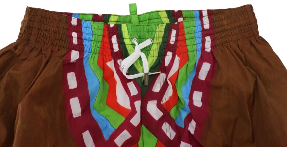 Short de bain homme Dsquared² à imprimé multicolore, maillot de plage élégant et confortable pour l'été.