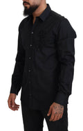 Chemise noire à fleurs roses Dolce & Gabbana en coton slim fit, détails visibles et style élégant.