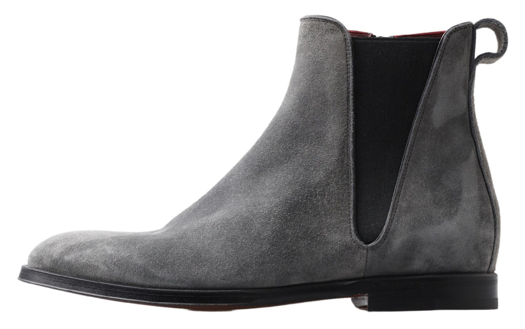 Bottes hommes en cuir gris Dolce & Gabbana, chaussures ankle élégantes avec semelle en caoutchouc, vue de côté.