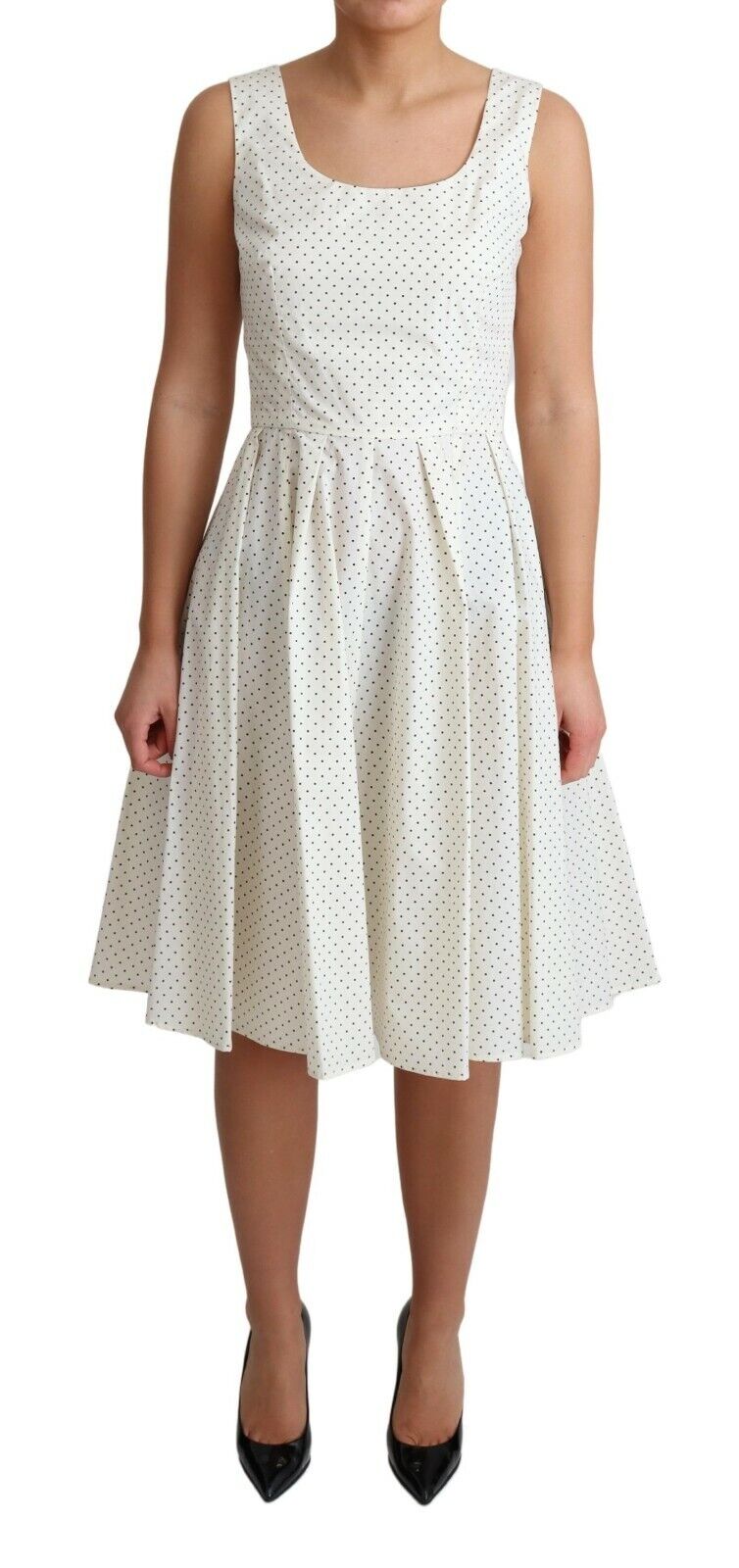 Robe blanche à pois en coton Dolce & Gabbana, coupe évasée et élégante, idéale pour une tenue chic et décontractée