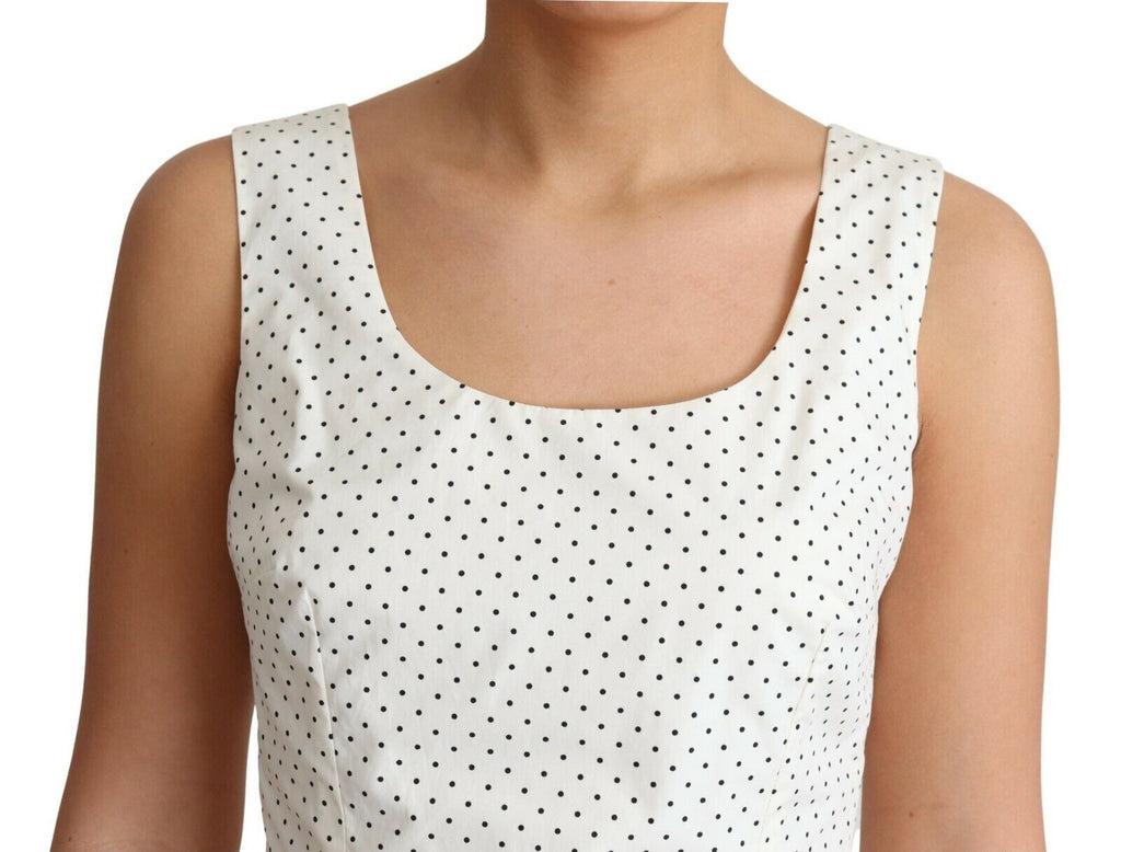 Robe blanche à pois en coton Dolce & Gabbana, coupe évasée et élégante, avec motif à pois sur toute la robe.