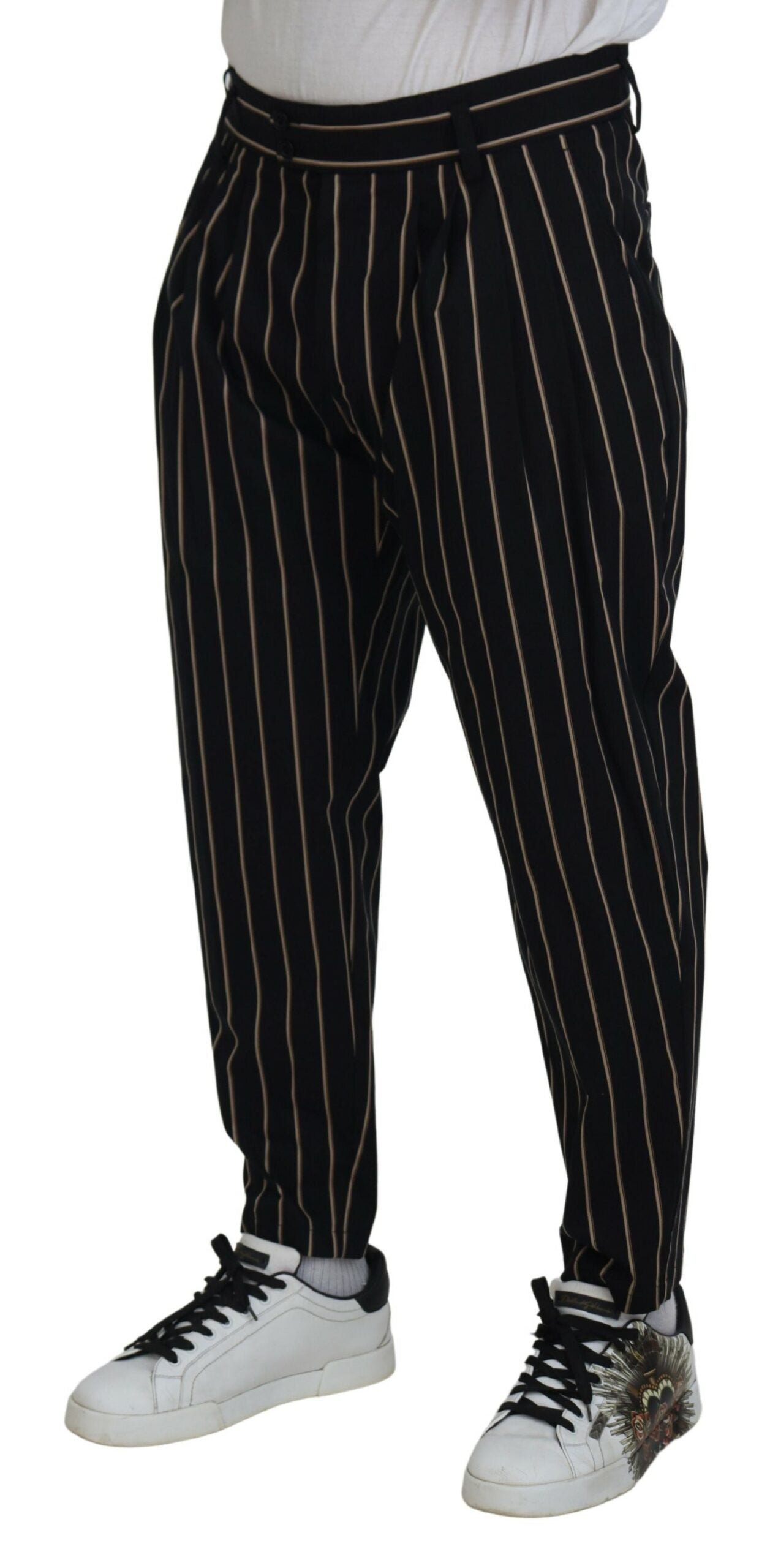 Pantalons en coton stretch noir et beige à rayures de Dolce & Gabbana, coupe ajustée et détails élégants.