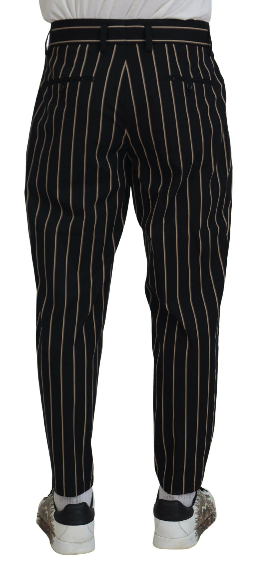 Pantalons stretch en coton noir et beige à rayures de Dolce & Gabbana, style élégant et confortable.