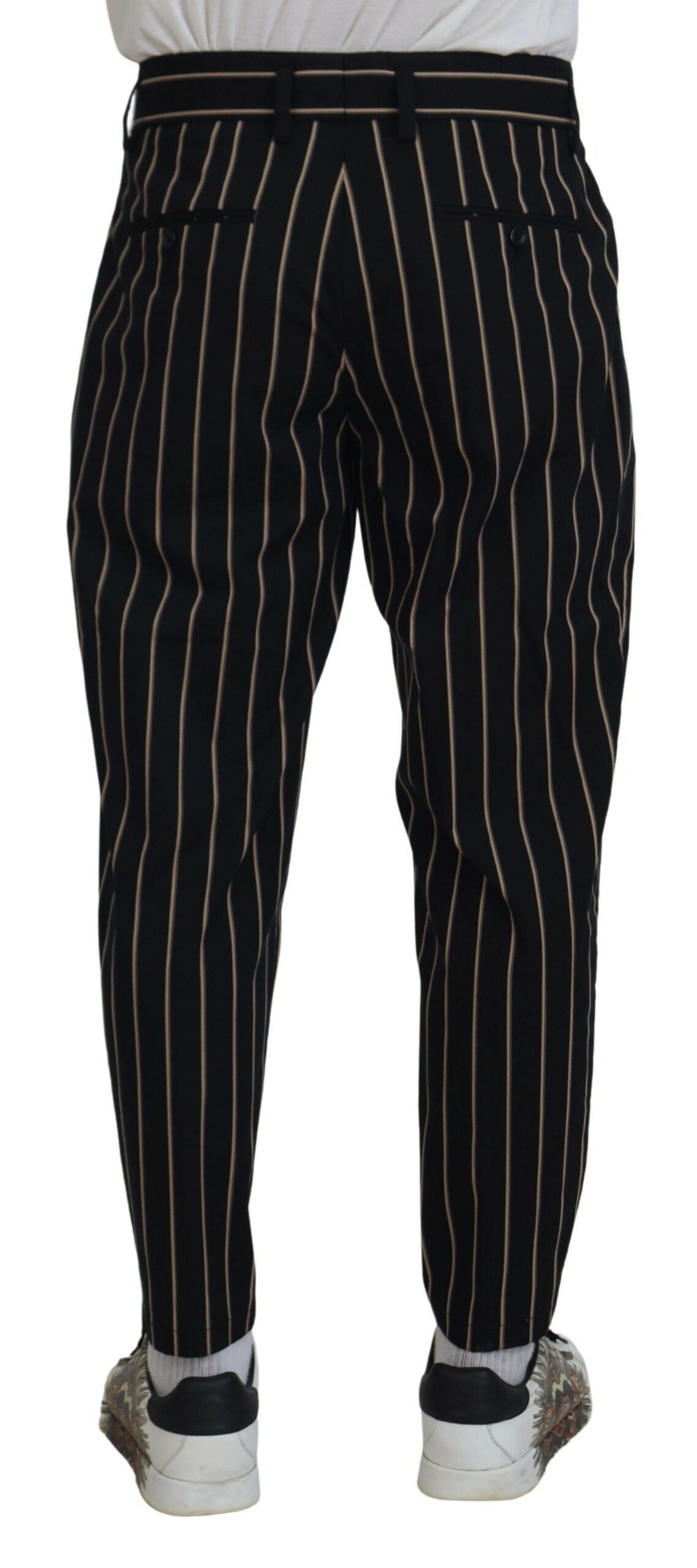 Pantalons stretch en coton noir et beige à rayures de Dolce & Gabbana, style élégant et confortable.