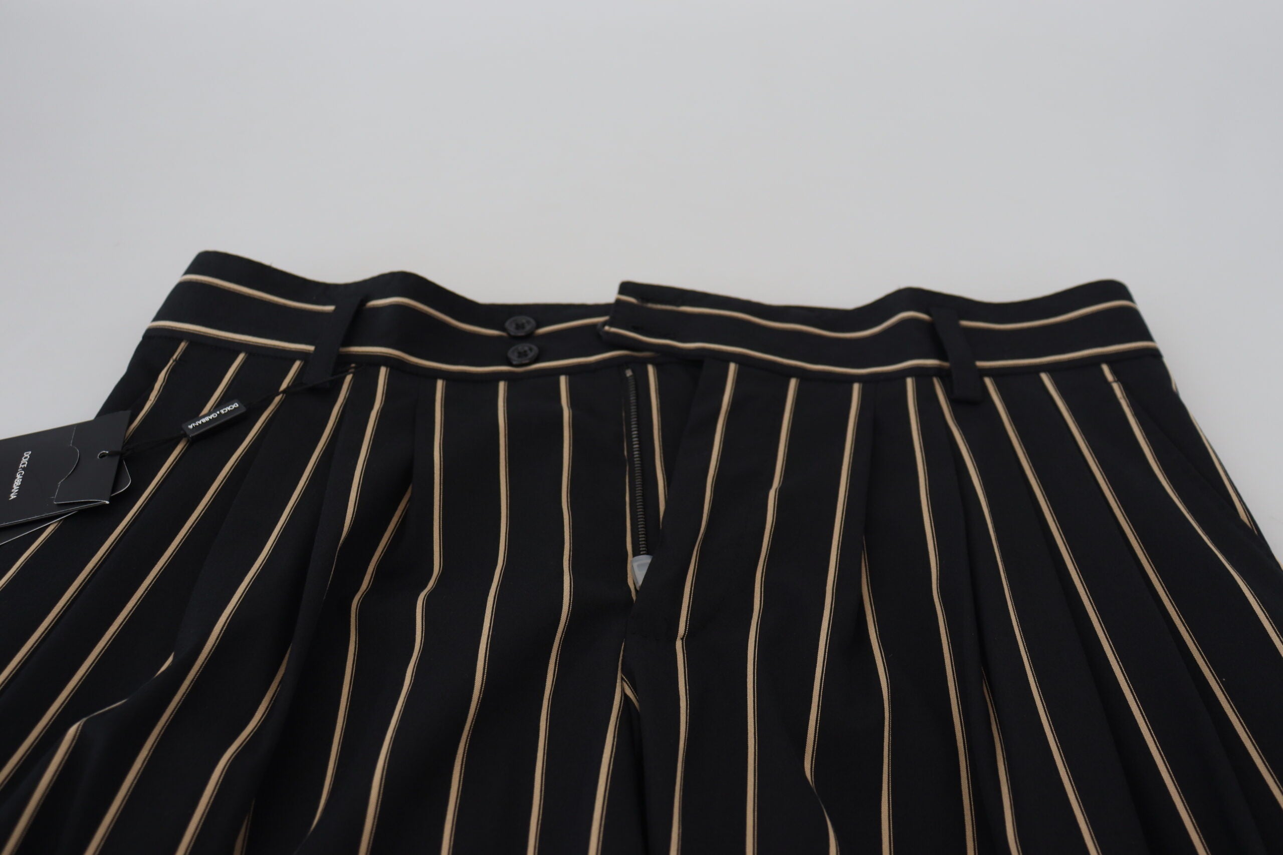 Pantalons en coton stretch à rayures noires et beiges de Dolce & Gabbana, coupe élégante et confortablement ajustée.