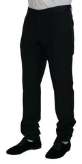 Pantalon en laine et soie noir de Dolce & Gabbana, robe élégante avec détails sophistiqués, vue de face sur fond neutre