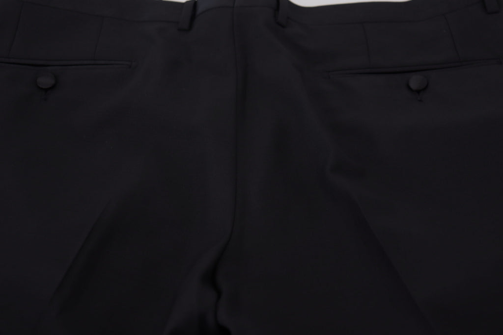 Pantalon en laine et soie noir Dolce & Gabbana, style élégant avec coupe tendance, visible sur un mannequin.
