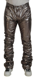 Pantalons en nylon stretch métallisé argenté de Dolce & Gabbana, style élégant et moderne, visibles en détail dans l'image.