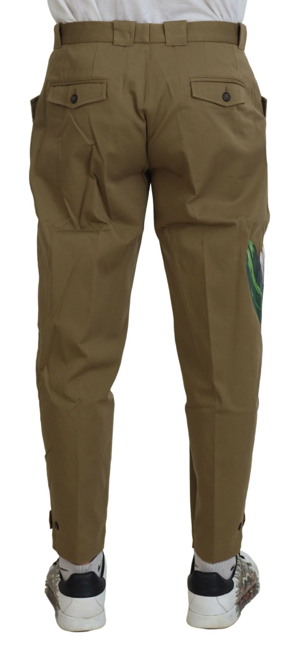 Pantalon chino Dolce & Gabbana beige en coton stretch avec motif floral, élégant et confortable pour homme.