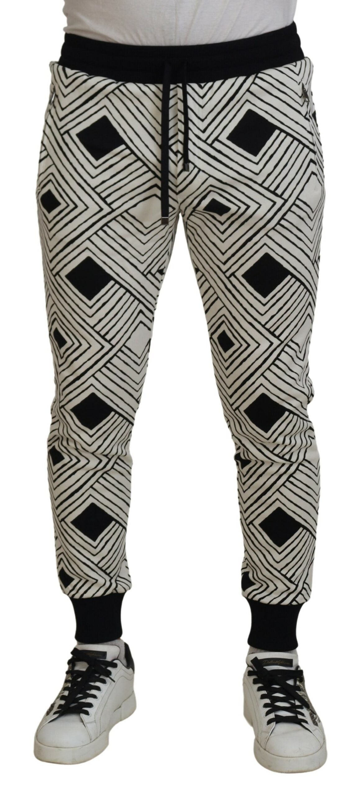 Pantalons de sport Dolce & Gabbana en coton noir et blanc, style décontracté avec ceinture élastique et poches latérales.