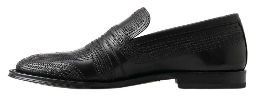 Chaussures loafers en cuir noir Dolce & Gabbana, chaussures à couture, style élégant et moderne, vues de face.