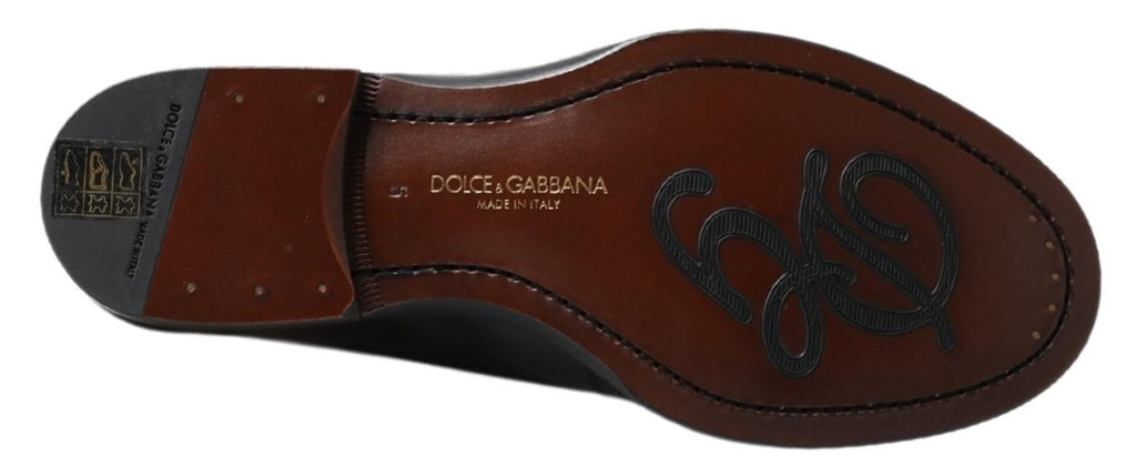 Chaussures mocassins en cuir noir Dolce & Gabbana, slippers en cuir avec couture visible, chaussures élégantes pour homme.