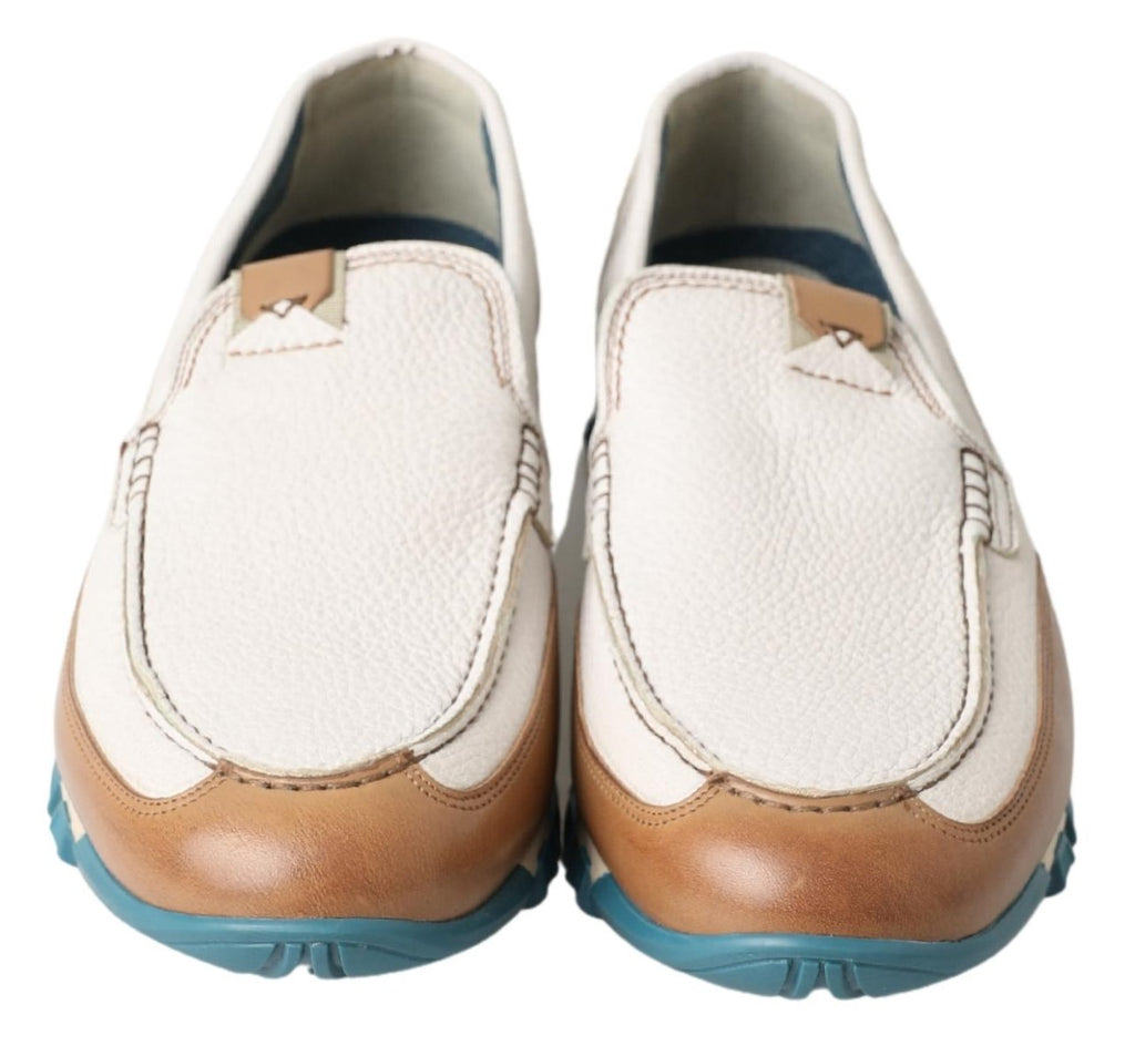 Mocassins en cuir blanc Dolce & Gabbana pour hommes, chaussures élégantes en style loafers avec finition lisse et semelle en cuir.
