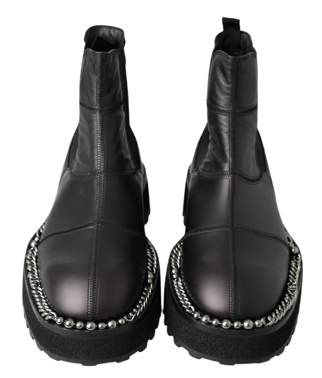 Bottes noires en cuir stretch Dolce & Gabbana à enfiler, élégantes et ajustées, pour un style sophistiqué et moderne.