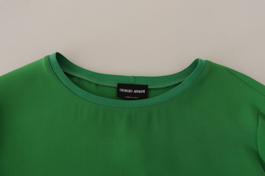 Pull en soie verte Armani à manches longues et col rond, élégant et confortable pour un style sophistiqué.