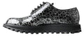 Chaussures Derby en cuir verni noir et blanc de Dolce & Gabbana, élégantes et sophistiquées pour homme.