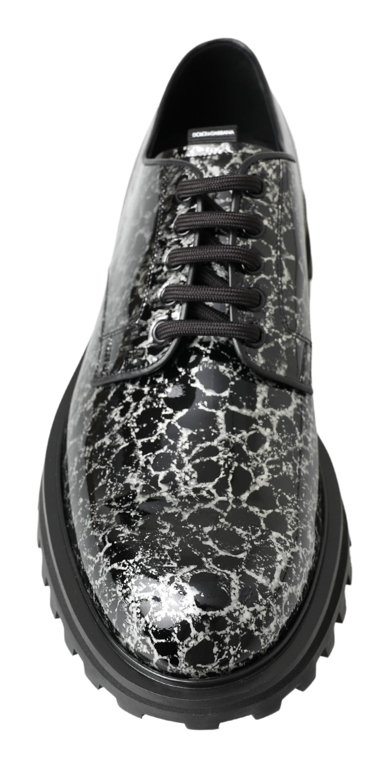 Chaussures Derby en cuir brillant noir et blanc de Dolce & Gabbana, élégantes et sophistiquées.
