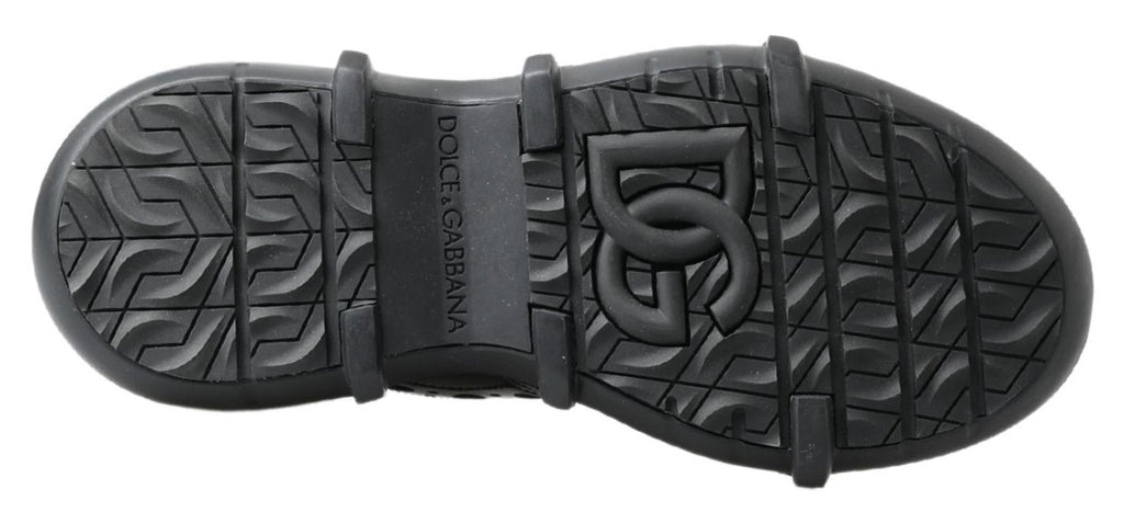 Chaussures bottines décontractées en cuir noir Dolce & Gabbana pour femme, style élégant et moderne.