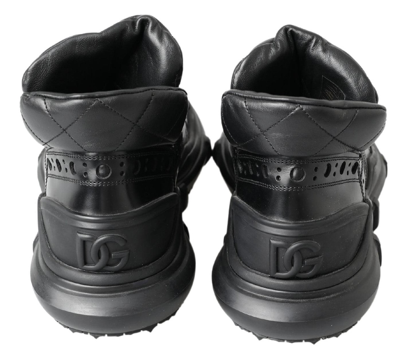 Bottes basses en cuir noir Dolce & Gabbana, chaussures décontractées pour la cheville, style élégant et moderne.