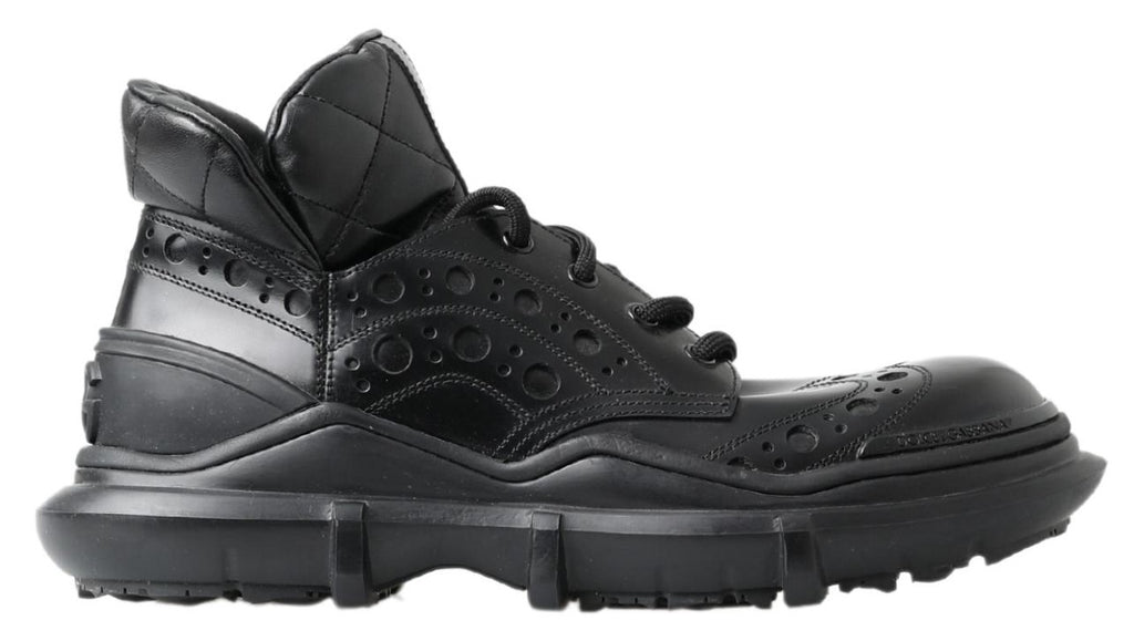 Bottes décontractées en cuir noir de la marque Dolce & Gabbana, style ankle, pour femmes ou hommes.