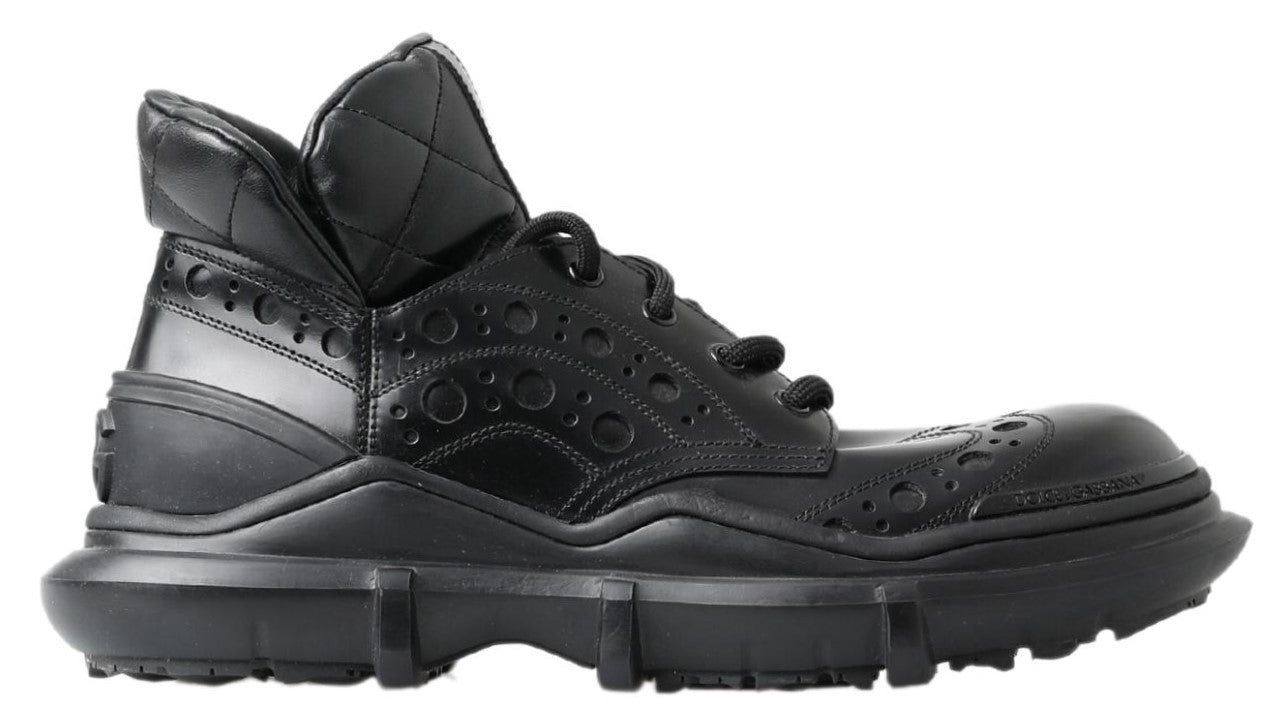Bottes décontractées en cuir noir de la marque Dolce & Gabbana, style ankle, pour femmes ou hommes.