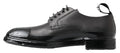 Chaussures derby en cuir noir Dolce & Gabbana, élégantes et classiques, avec lacets et finition soignée.