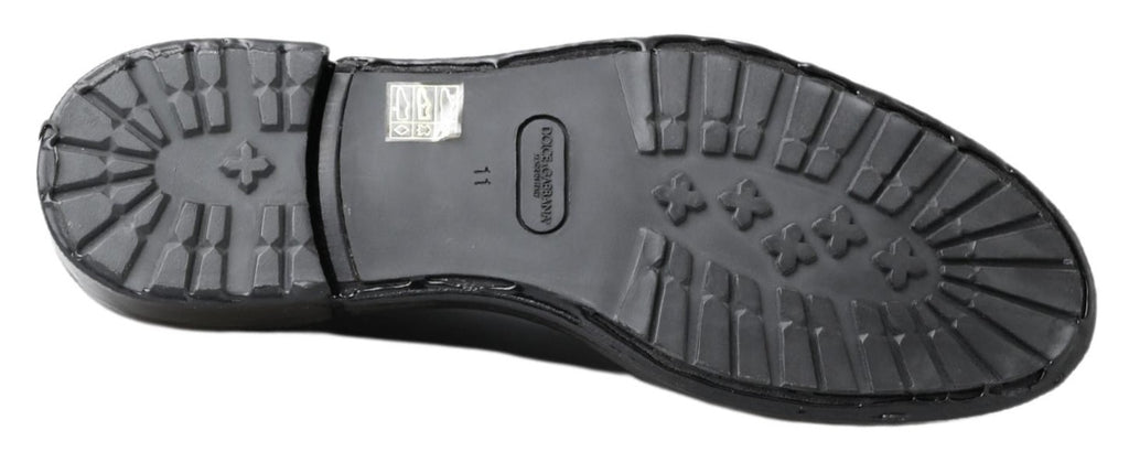 Chaussures derby en cuir noir de Dolce & Gabbana, élégantes et sophistiquées pour homme, vues de face.