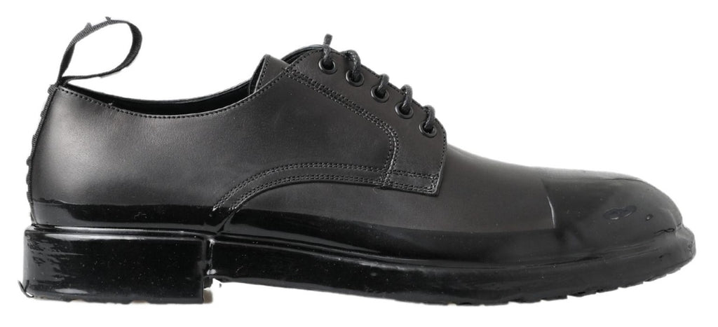 Chaussures Derby en cuir noir de Dolce & Gabbana, élégantes et sophistiquées pour hommes.