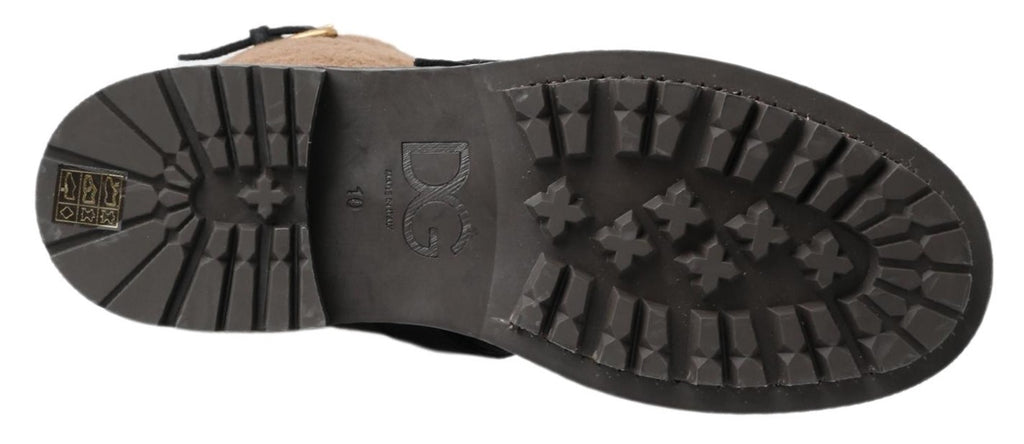 Bottes en cuir noir et shearling marron de Dolce & Gabbana, chaussures élégantes pour l'hiver.