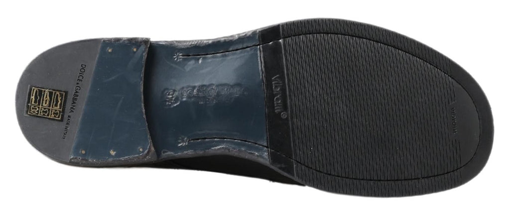 Bottes Perugino en cuir noir Dolce & Gabbana avec motif de cheval, élégantes et sophistiquées, pour un style raffiné.