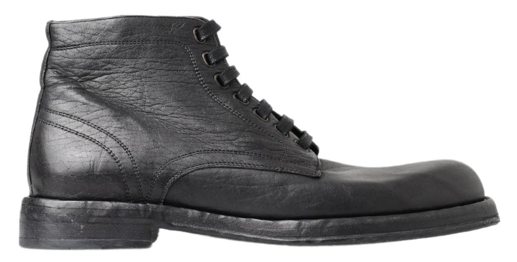 Bottes en cuir noir Dolce & Gabbana Horse Perugino, style élégant avec détails en cuir et semelle en caoutchouc.