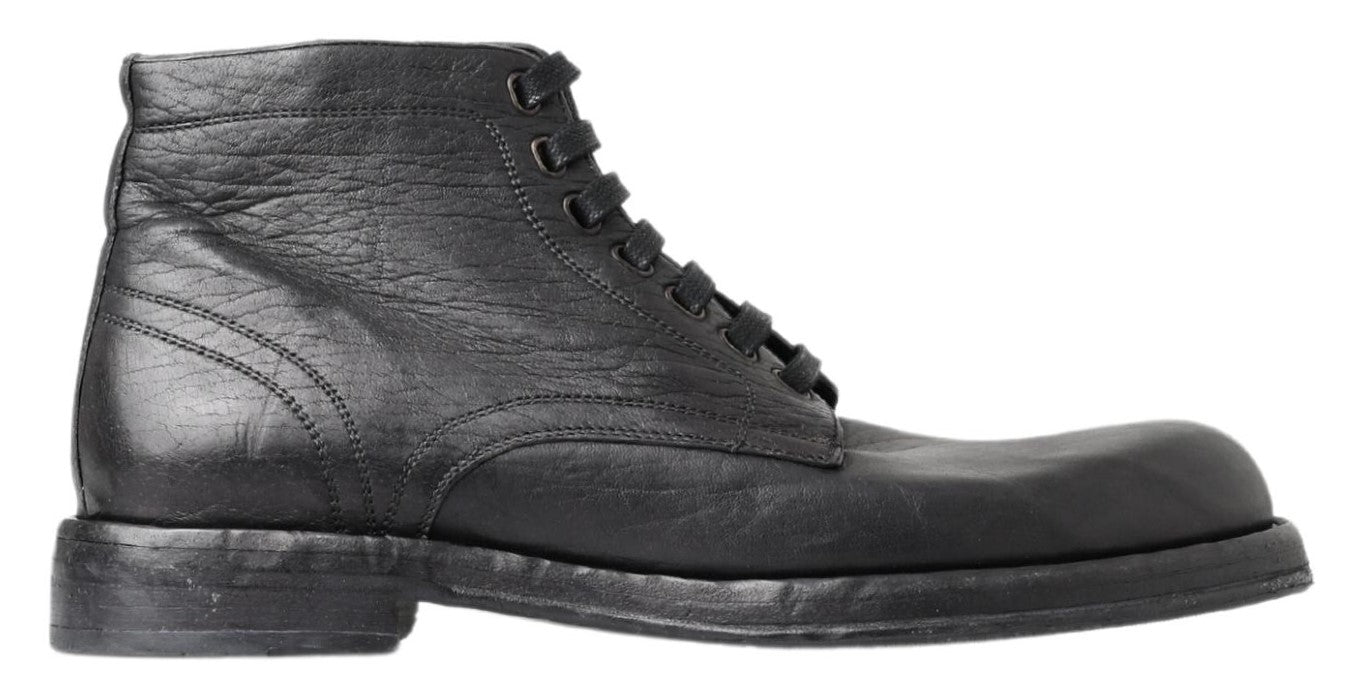 Bottes en cuir noir Dolce & Gabbana Horse Perugino, style élégant avec détails en cuir et semelle en caoutchouc.