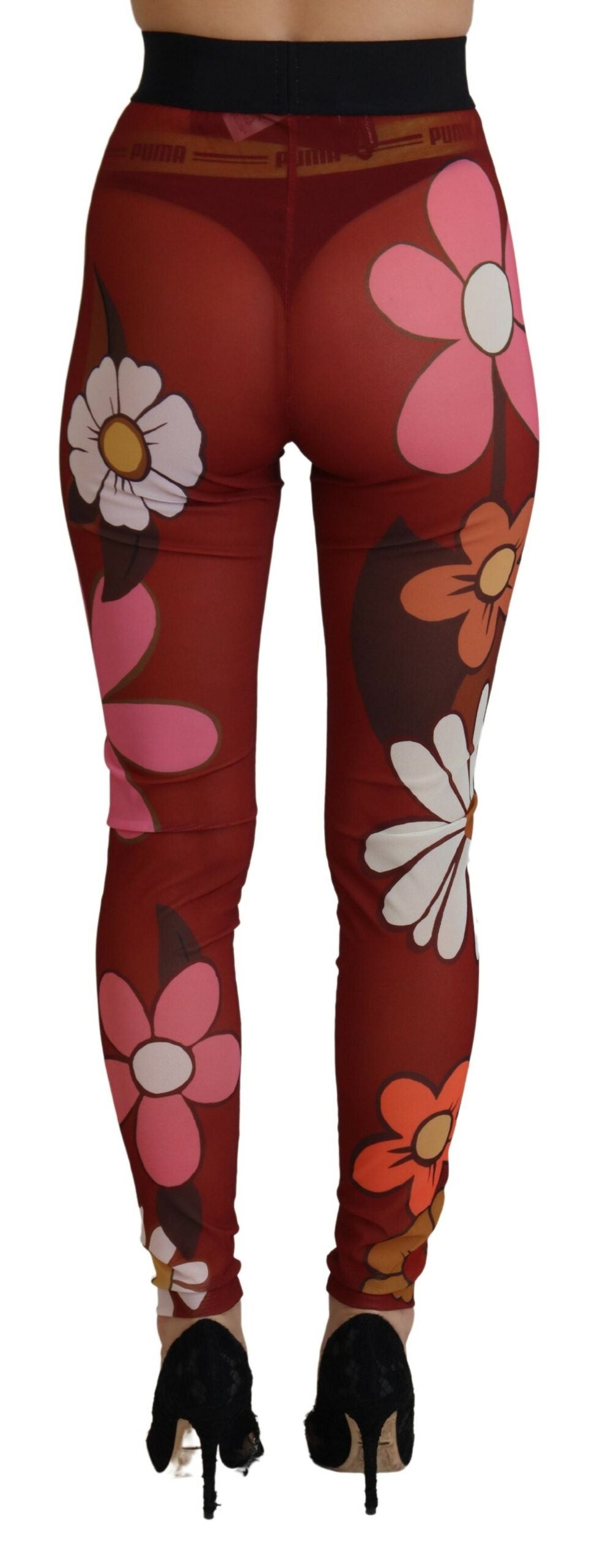 Leggings rouges Dolce & Gabbana à fleurs, coupe stretch et taille élastique, pour un look élégant et confortable.