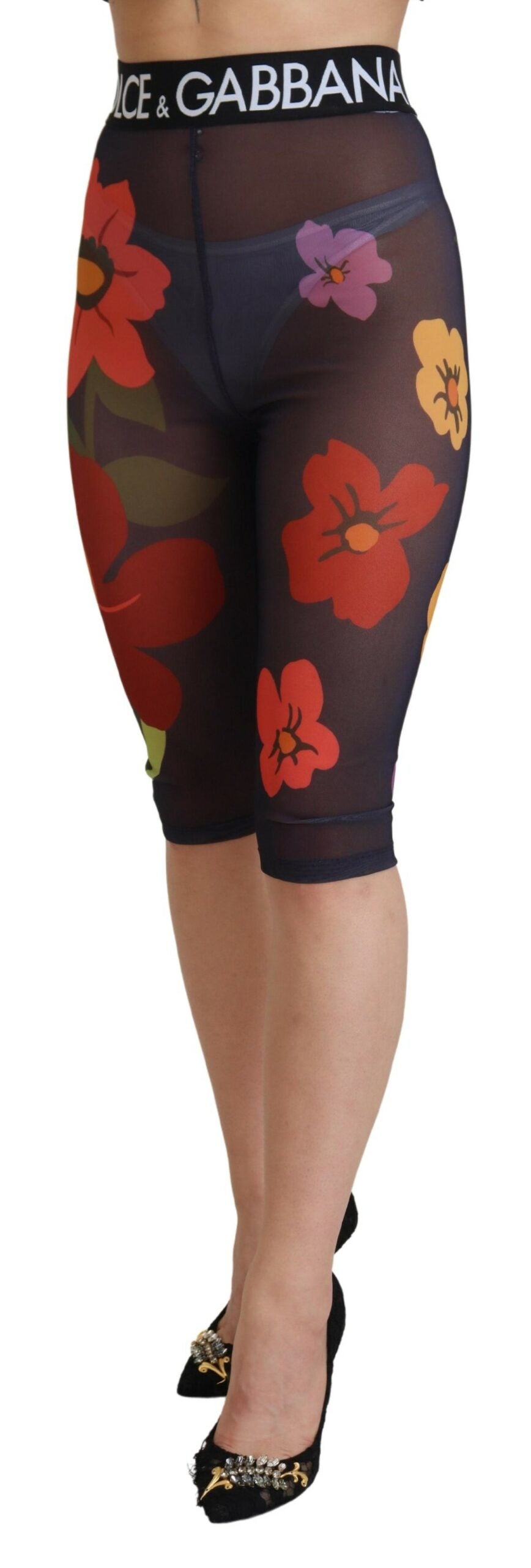 Leggings noires Dolce & Gabbana à fleurs, en tissu extensible avec taille élastique, mode élégante et confortable.