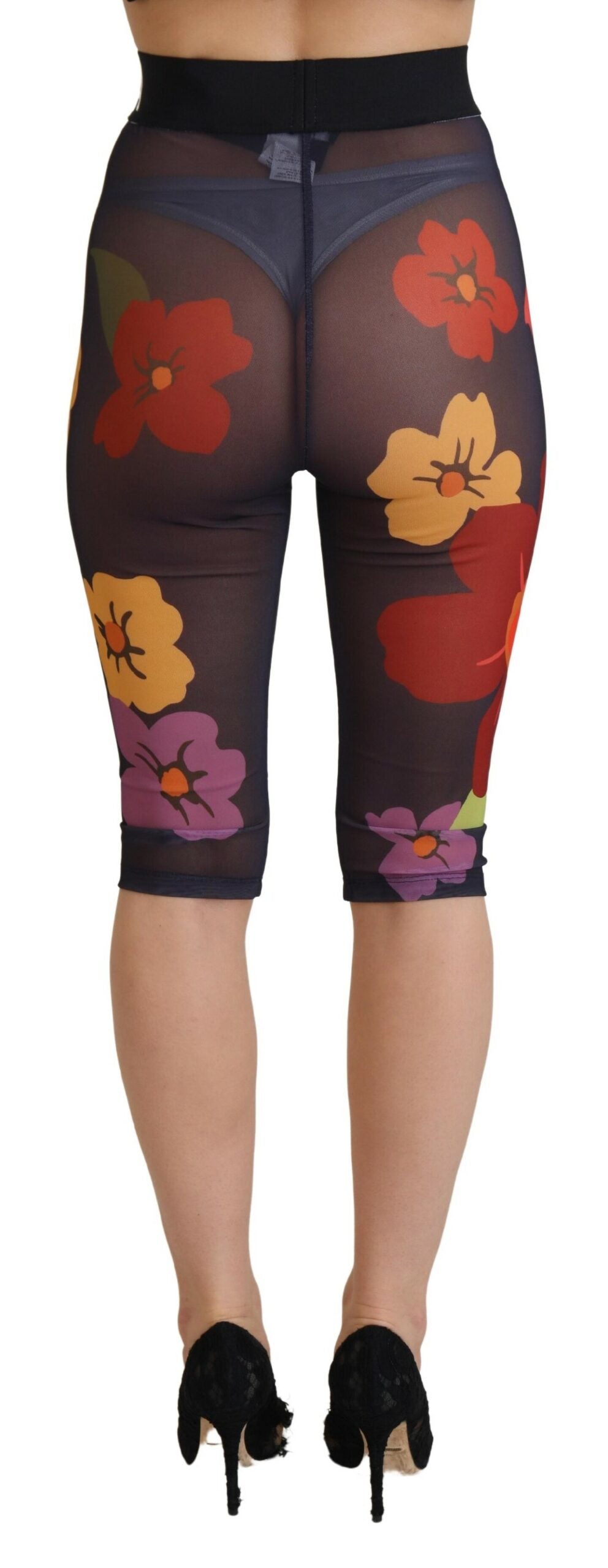 Leggings noires Dolce & Gabbana à motifs floraux, pantalons extensibles avec taille élastique et coupe ajustée.