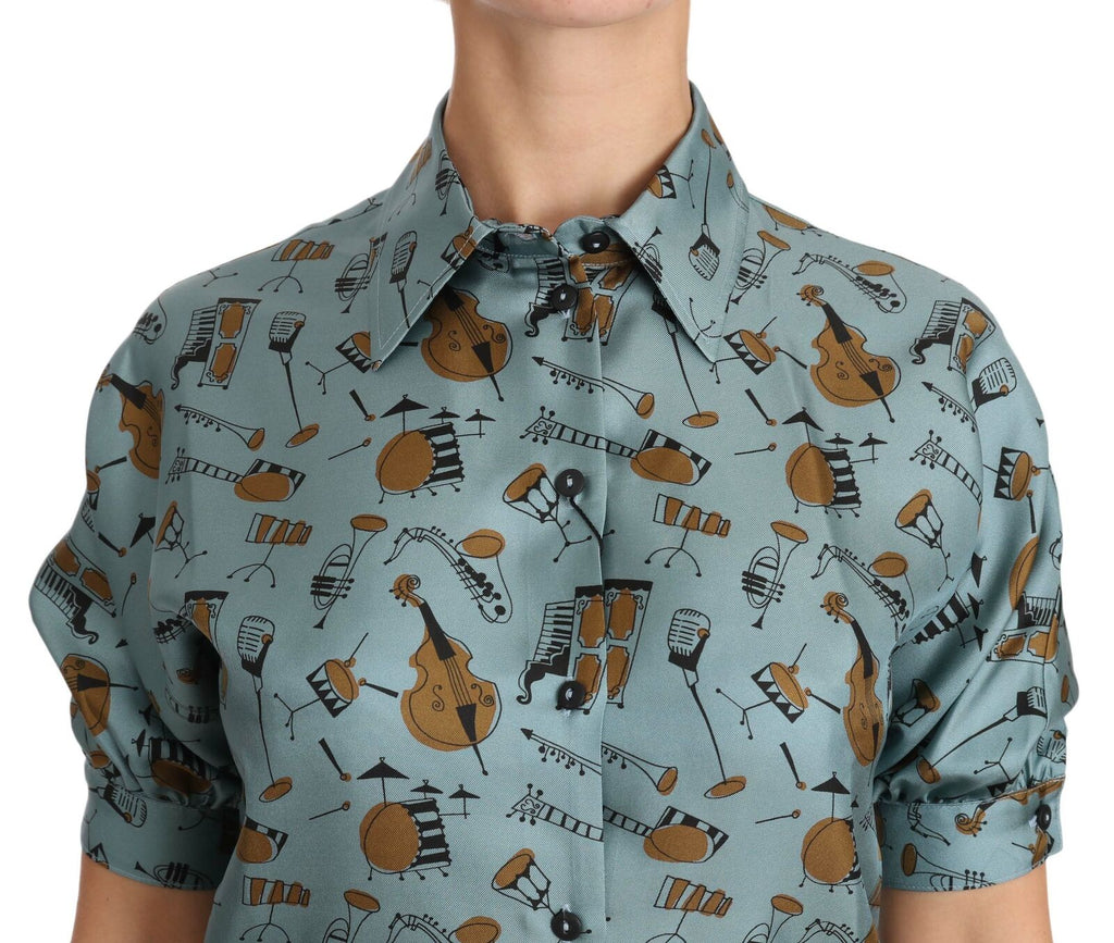 Chemise courte en soie Dolce & Gabbana à motifs multicolores d'instruments de musique, manches courtes, style élégant et coloré.