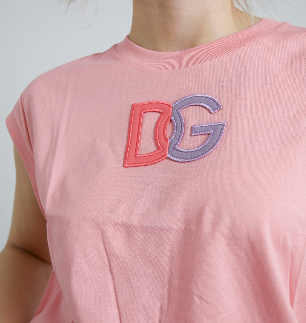 T-shirt Dolce & Gabbana en coton rose avec logo DG, col rond et coupe décontractée, vue de face.